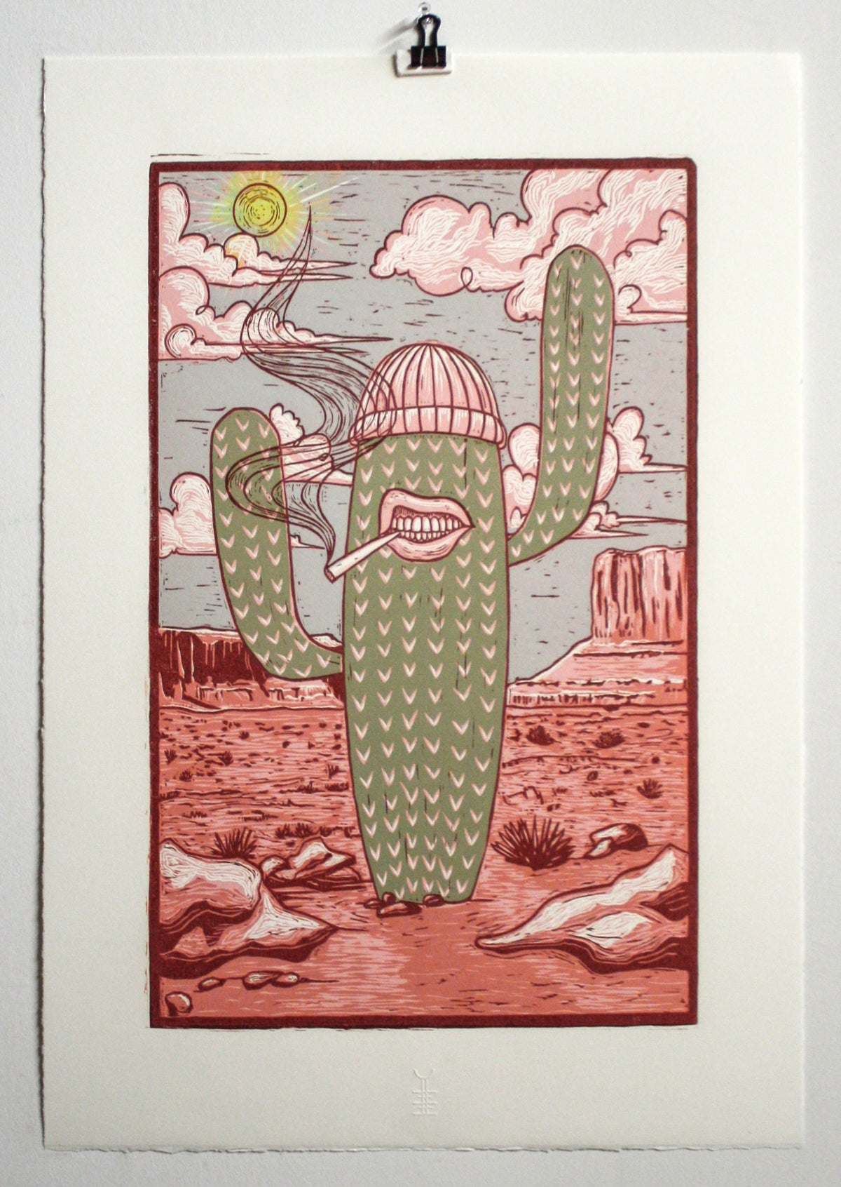 Large handmade woodcut print with desert landscape and southwestern motifs