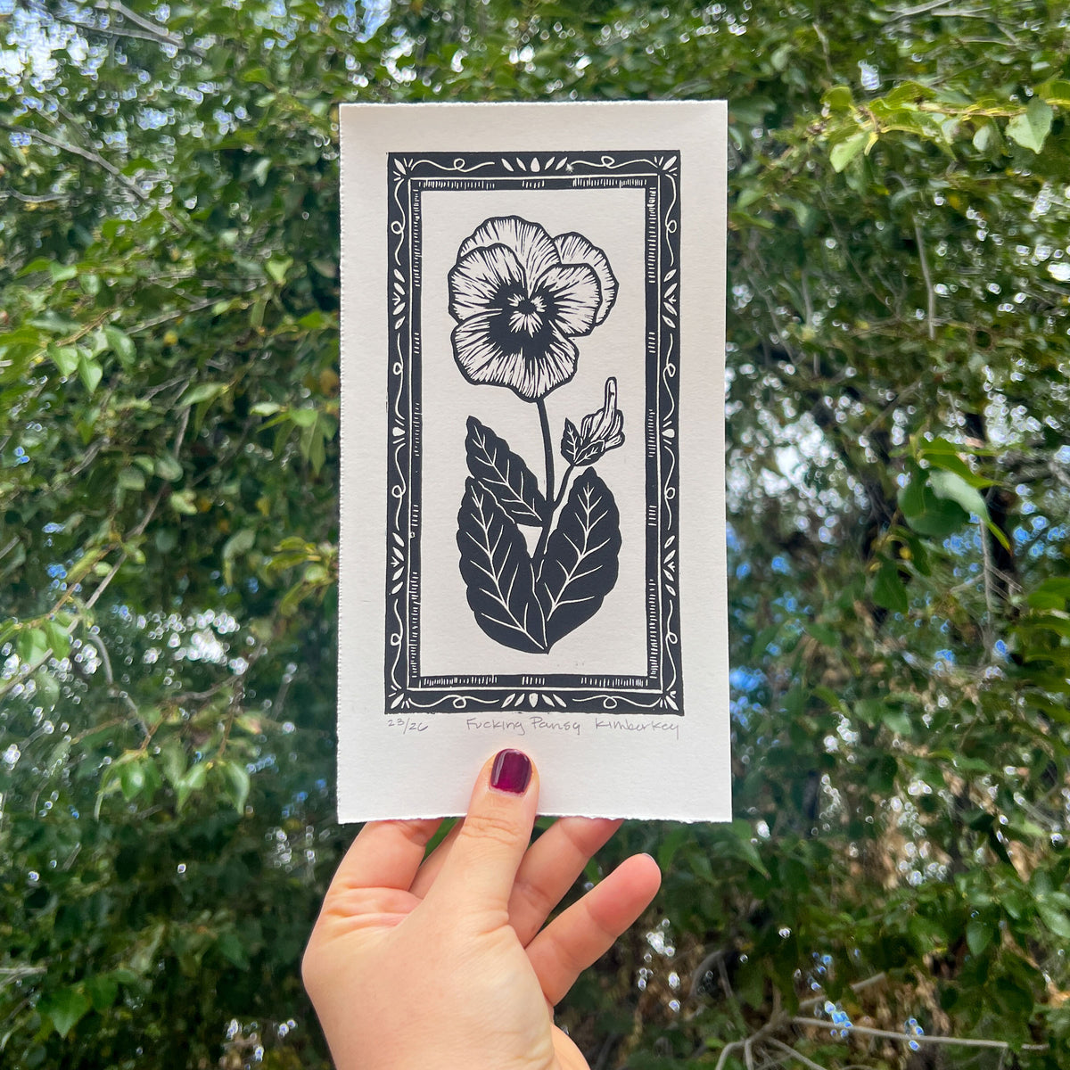 Handmade linocut print of a pansy flower with attitude, limited edition botanical art
