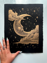 Load image into Gallery viewer, Handmade linocut print of a sad crescent moon face on archival paper