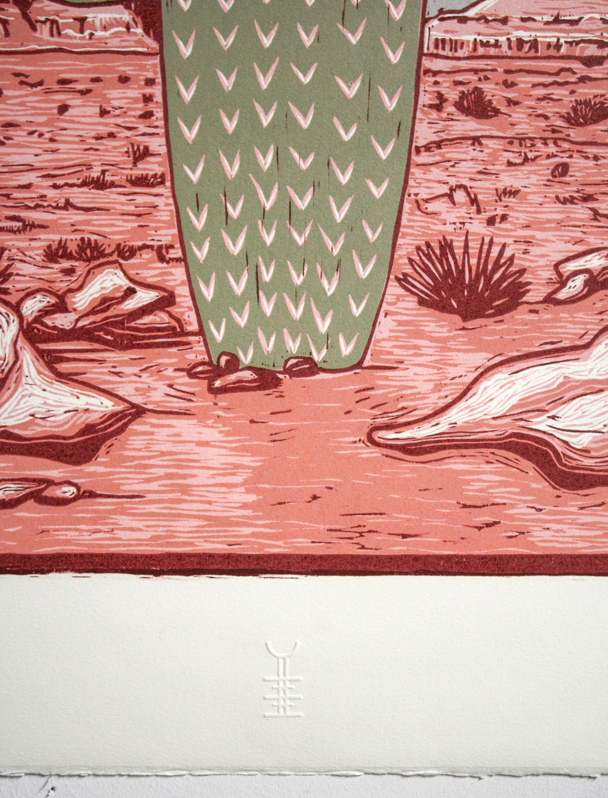 Large handmade woodcut print with desert landscape and southwestern motifs