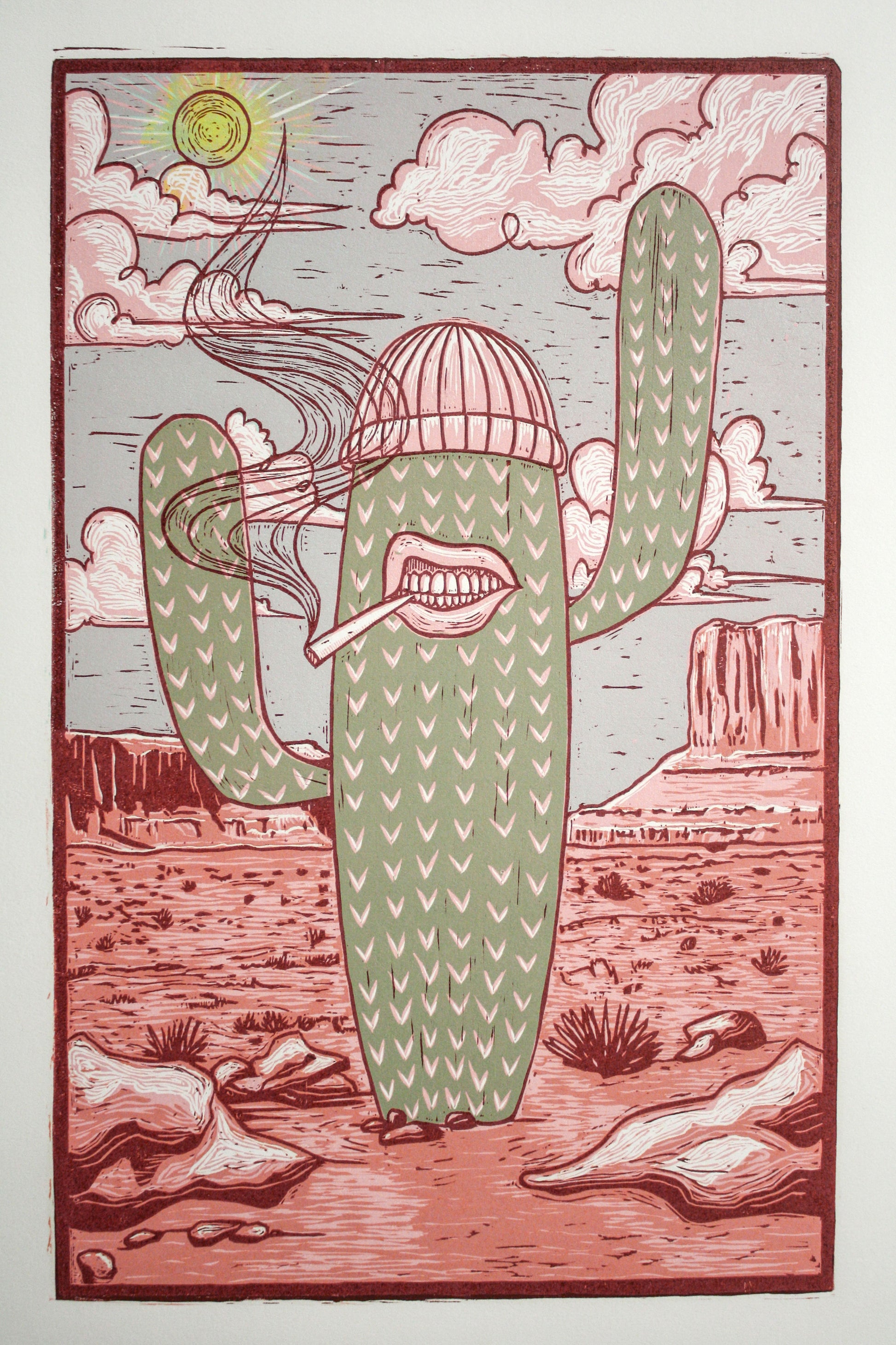 Large handmade woodcut print with desert landscape and southwestern motifs