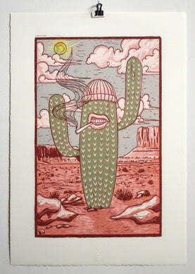 Large handmade woodcut print with desert landscape and southwestern motifs