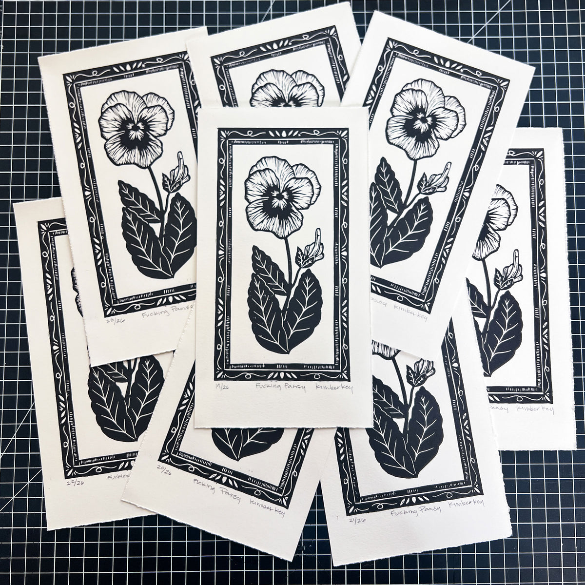 Handmade linocut print of a pansy flower with attitude, limited edition botanical art